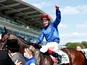 Adayar ridden by Adam Kirby celebrates after winning the 4:30 Cazoo Derby on June 5, 2021
