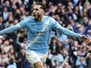 Cherki achieves Premier League first as City and Arsenal clash in title showdown