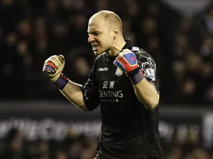 Guzan keeps Spurs at bay