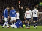 Tottenham Hotspur's Lucas Moura is shown a red card by referee David Coote on April 3, 2023
