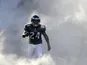 Philadelphia Eagles cornerback Nnamdi Asomugha runs onto the field prior to his side's NFL match with the Washington Redskins on December 23, 2012