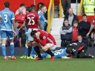 Mings denies stamping on Ibrahimovic