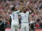 Raheem Sterling and Jermain Defoe celebrate during the World Cup qualifier between England and Lithuania on March 26, 2017