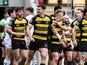 Sam Wood celebrates scoring a try for York Knights during a Super League match.