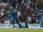 Sri Lanka's Tilakaratne Dilshan celebrates moments after catching out Australia's Clint McKay during the ICC Champions Trophy on June 17, 2013