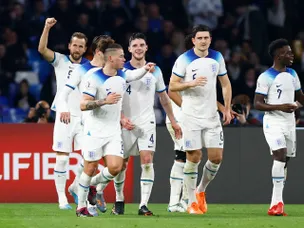 Kane makes history as 10-man England edge past Italy