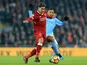 Roberto Firmino and Danilo in action during the Premier League game between Liverpool and Manchester City on January 14, 2018