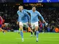 Manchester City's Julian Alvarez celebrates scoring their third goal with Erling Haaland on November 28, 2023