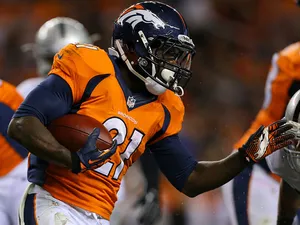Denver Broncos' Ronnie Hillman runs with the ball during the game against Oakland Raiders on September 23, 2013