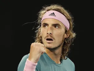 Tsitsipas books debut slam semi-final with victory over Bautista Agut