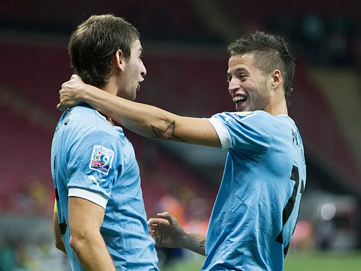 Lopez brace secures Uruguay quarter-final place