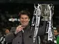 Swansea City manager Michael Laudrup celebrates with the Capital One Cup final trophy on February 24, 2013