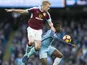 Ben Mee battles with Kelechi Iheanacho during the Premier League game between Manchester City and Burnley on January 2, 2017