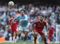 Manchester City's Jack Grealish in action with Nottingham Forest's Gonzalo Montiel on September 23, 2023