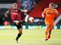 Newcastle United's Dwight Gayle in action with Bournemouth's Steve Cook, July 1, 2020