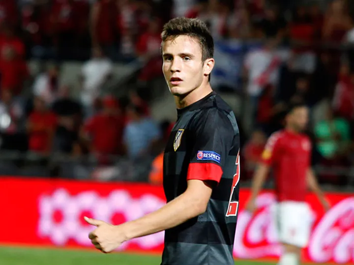 Saul heads Atletico ahead