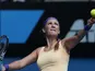 Victoria Azarenka of Belarus serves to Jamie Hampton during their third round match at the Australian Open tennis championship on January 19, 2013