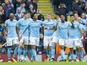 Raheem Sterling celebrates with teammates after scoring during the Premier League game between Manchester City and Crystal Palace on September 23, 2017