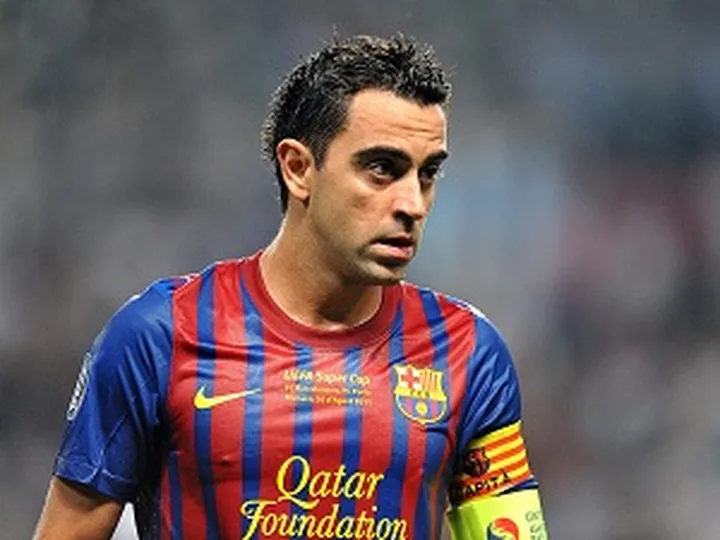 Xavi wary of Milan threat