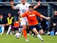 Rooney signs new Luton deal
