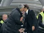 Jose Mourinho borrows old pal Wenger's coat to attend the Premier League game between Chelsea and Manchester United on October 23, 2016