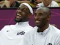 Lebron James (L) and Kobe Bryant of the U.S. smile during the men's preliminary round Group A basketball match against Nigeria at the Basketball Arena during the London 2012 Olympic Games August 2, 2012