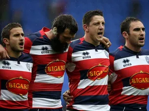 Agen players sing national anthem during silence