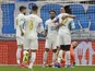 Marseille's Arkadiusz Milik celebrates scoring their second goal with teammates on February 17, 2022