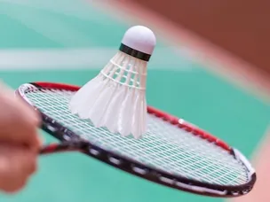 Why is badminton more popular in Asia than in Europe?