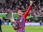 Crystal Palace's Daichi Kamada celebrates with the Conference League trophy on May 27, 2026