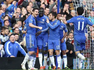 Second-half goals send Chelsea through