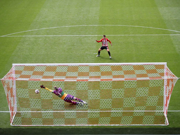 Brentford edge past Wycombe on penalties in first match at new stadium