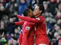 Javier Hernandez is congratulated by team mate Patrice Evra after scoring the opening goal against Chelsea in the FA Cup quarter final on March 10, 2013