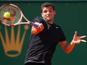 Dimitrov through to semis after Haas injury