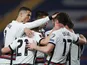 Portugal's Diogo Jota celebrates scoring their first goal with teammates on March 27, 2021