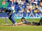 New Zealand's Mitchell McClenaghan dives in to make his ground and score the winning run during the match against Sri Lanka on June 9, 2013