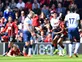 Bournemouth strike late to beat nine-man Spurs