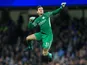 Ederson celebrates City's equaliser during the Premier League game between Manchester City and West Ham United on December 3, 2017